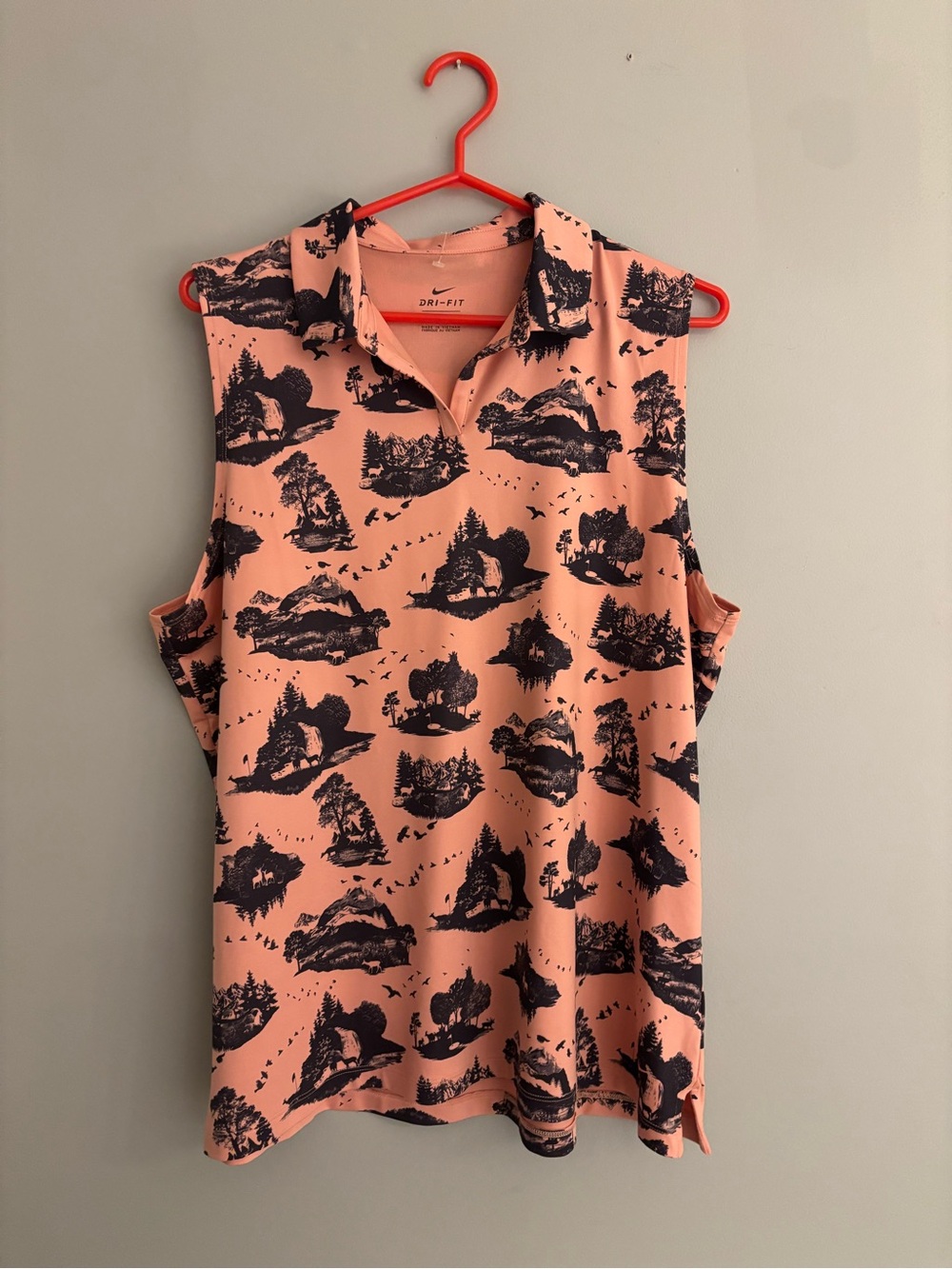 Nike Sleeveless Polo Tank in Peach with Black Scenic Print